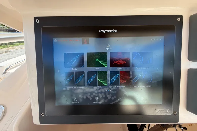 Slide: The Image of Raymarine navigation display on 2007 Grady-White Bimini 306 boat dashboard. - 32