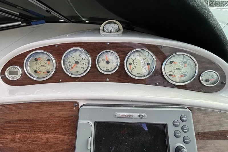 Slide: The Image of Dashboard of 2006 Chaparral Signature 350 boat with gauges and navigation system. - 9