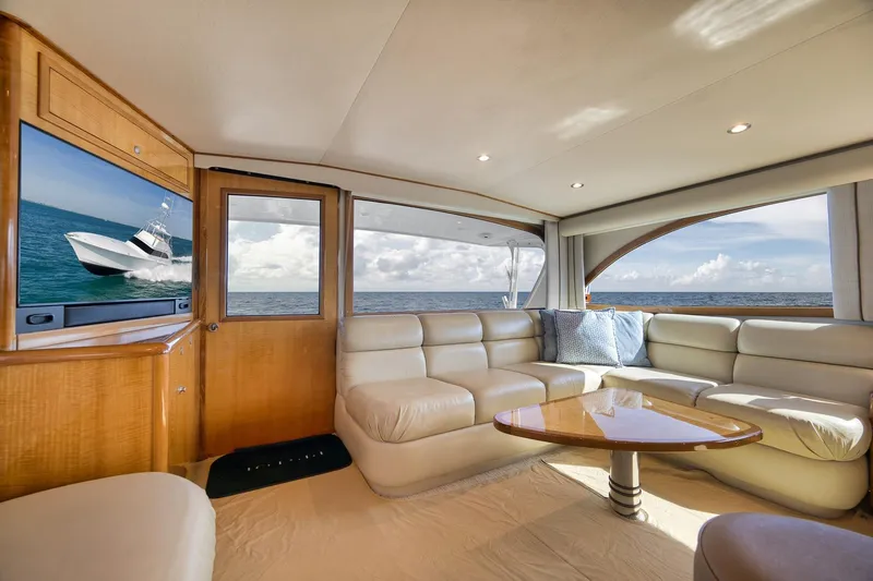 Slide: The Image of Luxurious interior of 2002 Weaver 60 Convertible yacht with ocean view and plush seating. - 13