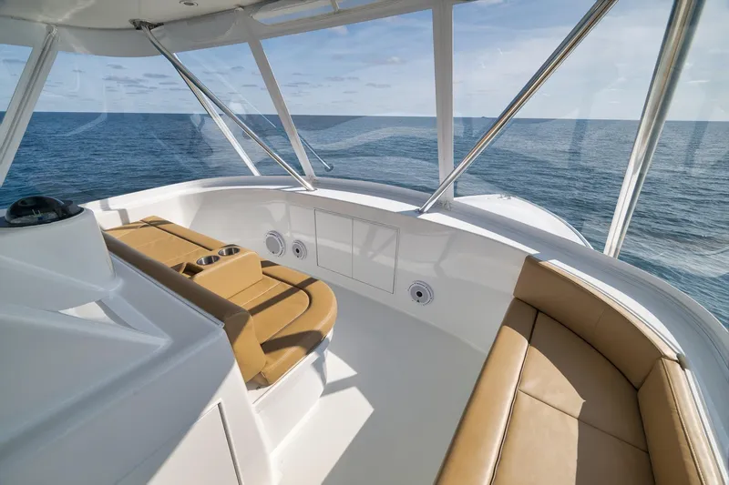 Slide: The Image of Luxurious Weaver 60 Convertible yacht interior, 2002 model, with ocean view and tan seating. - 29