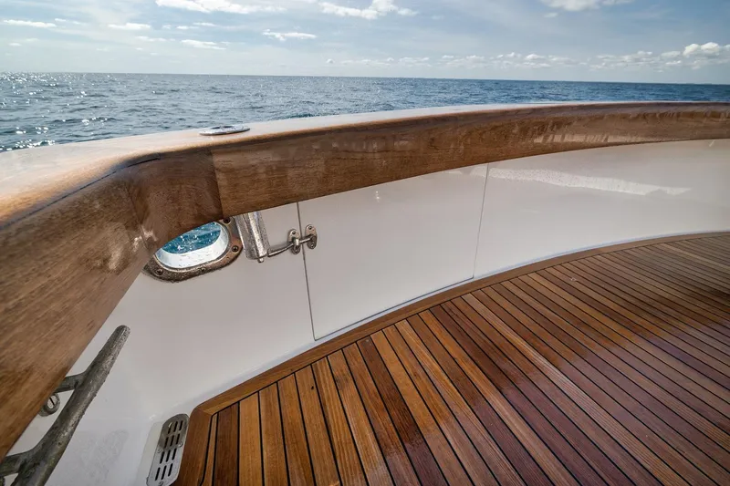 Slide: The Image of Wooden deck of 2002 Weaver 60 Convertible yacht with ocean view. - 47