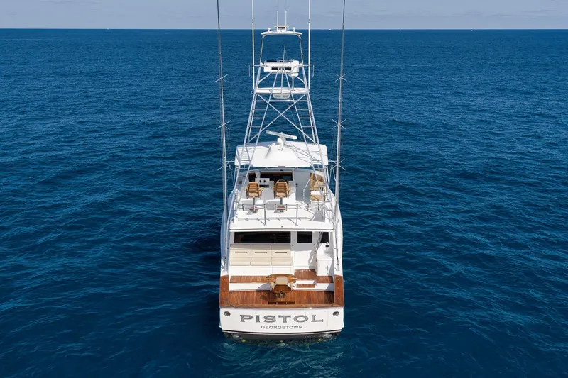 Slide: The Image of Luxury Weaver 60 Convertible yacht, 2002 model, named "Pistol" on open ocean. - 5
