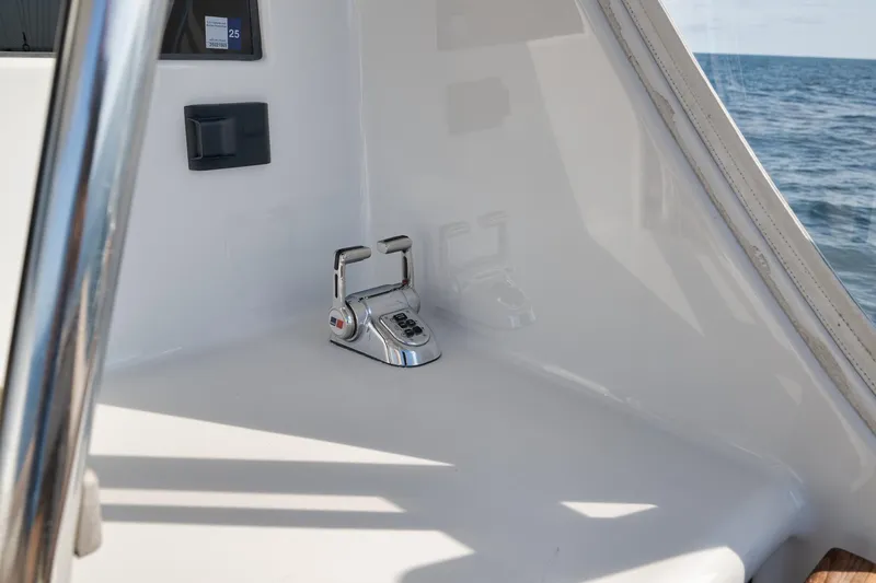 Slide: The Image of Control panel on a 2002 Weaver 60 Convertible yacht, overlooking the ocean. - 50