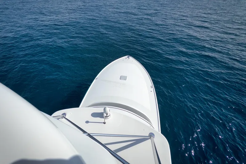 Slide: The Image of Bow of 2002 Weaver 60 Convertible yacht on open sea. - 60