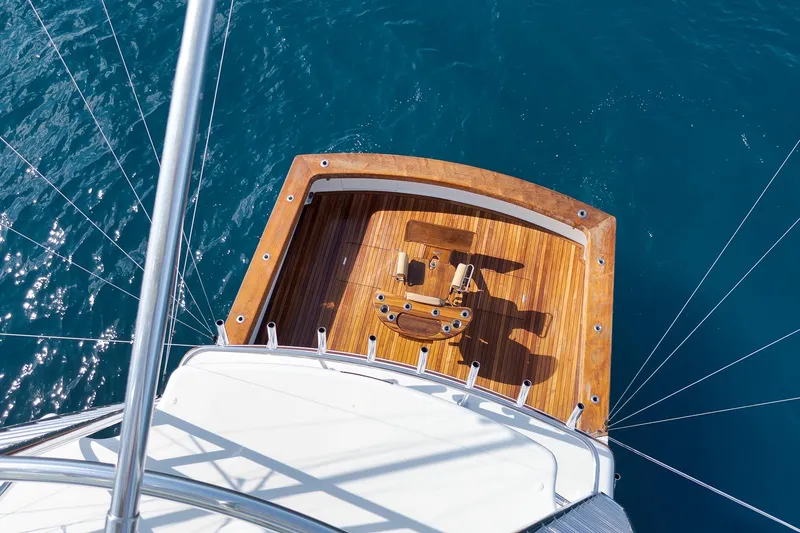 Slide: The Image of Aerial view of 2002 Weaver 60 Convertible yacht deck on blue ocean. - 62