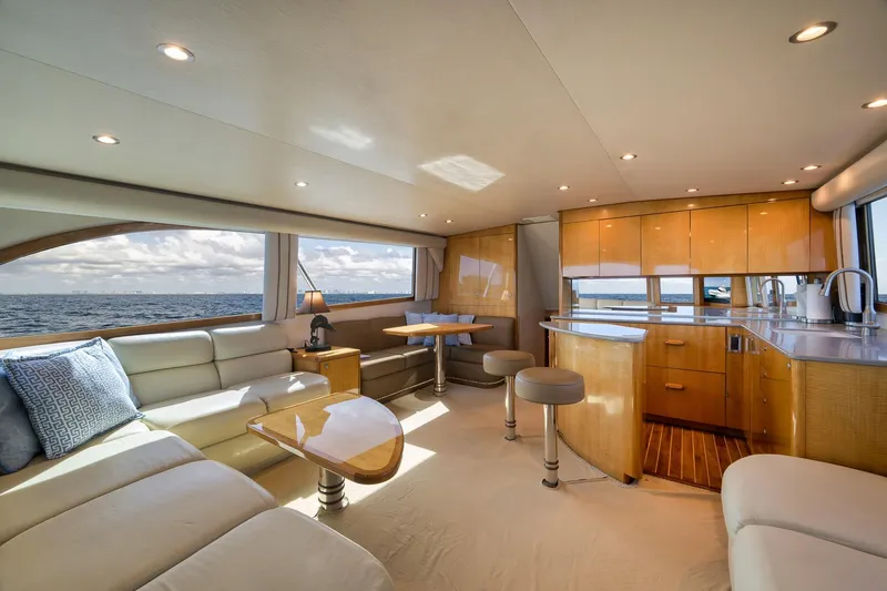 Slide: The Image of Luxurious interior of a 2002 Weaver 60 Convertible yacht with ocean view. - 7