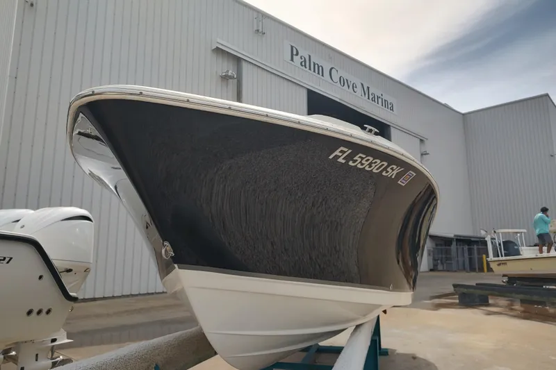 Slide: The Image of 2019 NauticStar 2302 Legacy Dual Console at Palm Cove Marina. - 9