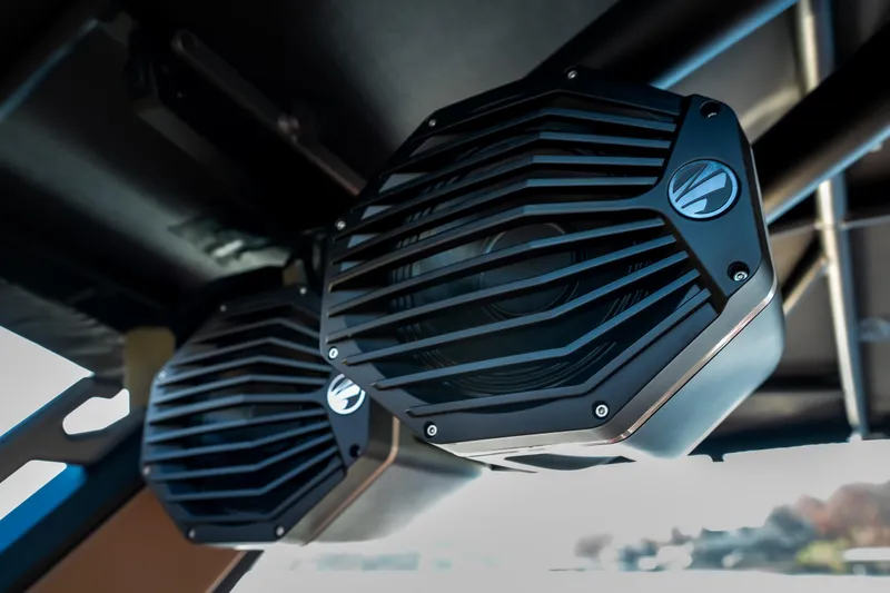 Slide: The Image of 2026 Tigé Z3 boat speakers with sleek black design and protective grille. - 11