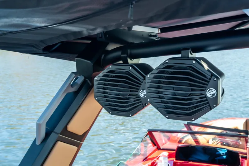 Slide: The Image of 2026 Tigé Z3 boat with mounted speakers, featuring sleek design and water backdrop. - 30