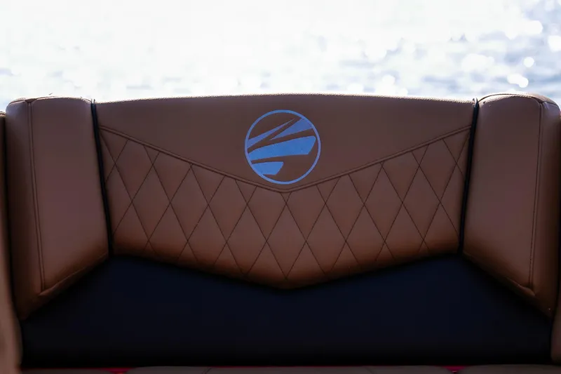 Slide: The Image of 2026 Tigé Z3 boat seat with brown leather and blue logo, diamond stitching. - 35