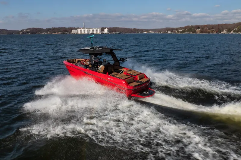 Slide: The Image of 2026 Tigé Z3 boat cruising on a lake, creating dynamic water splashes. - 36