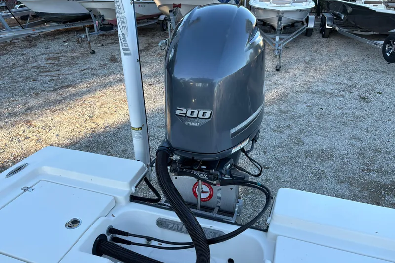 Slide: The Image of 2016 Pathfinder 2200 TRS boat with Yamaha 200 engine in a boatyard. - 14