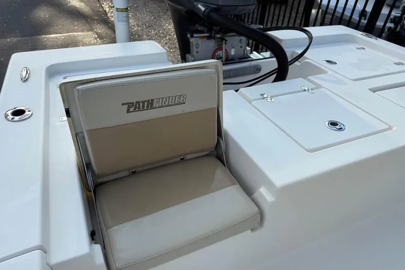 Slide: The Image of 2016 Pathfinder 2200 TRS boat seat and storage compartments. - 16