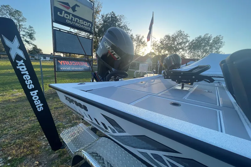 Slide: The Image of 2026 Xpress H20C Crappie boat at dealership, featuring sleek design and powerful engine. - 3
