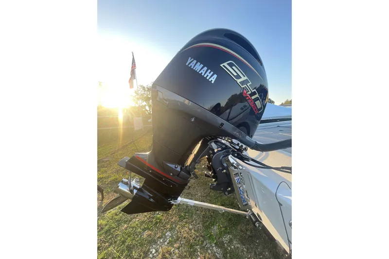 Slide: The Image of Outboard motor on 2026 Xpress H20C Crappie boat, Yamaha SHO VMAX, sunny background. - 6
