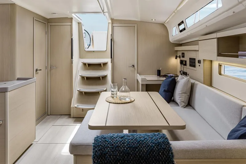 Slide: The Image of Manufacturer Provided Image: Interior of 2026 Beneteau Oceanis 40.1 yacht, featuring modern design and cozy seating area. - 5