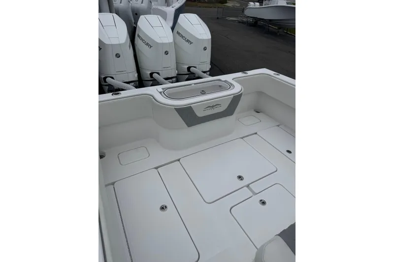 Slide: The Image of 2024 Invincible 36 Open Fisherman boat deck with Mercury engines. - 6