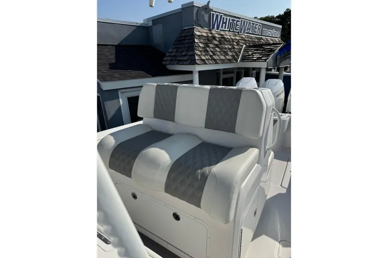 Slide: The Image of 2024 Invincible 36 Open Fisherman boat with cushioned seating at White Water Marine. - 8