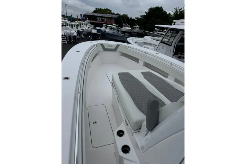 Slide: The Image of 2024 Invincible 36 Open Fisherman boat with spacious seating and sleek design. - 9