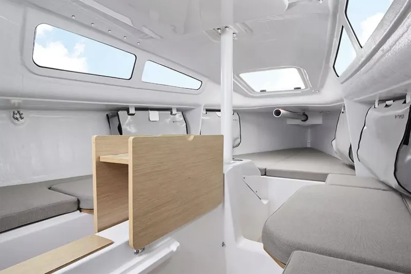 Slide: The Image of Manufacturer Provided Image: Interior of 2026 Beneteau First 24 sailboat, featuring modern design and comfortable seating. - 5