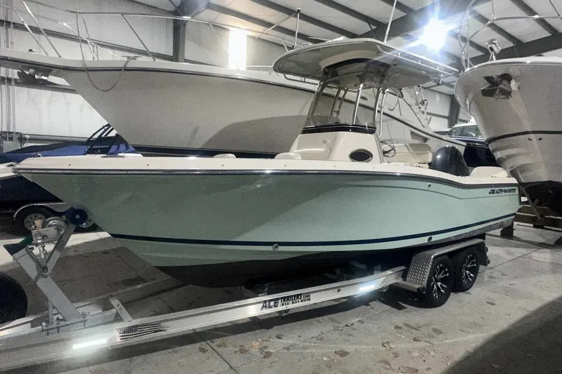 Slide: The Image of 2021 Grady-White Fisherman 216 boat on trailer in indoor storage facility. - 1