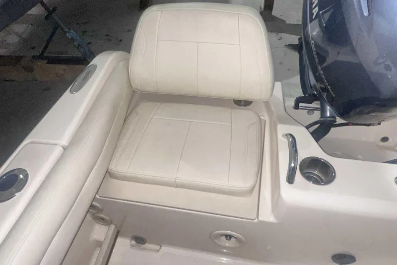 Slide: The Image of 2021 Grady-White Fisherman 216 boat seat and motor detail. - 12