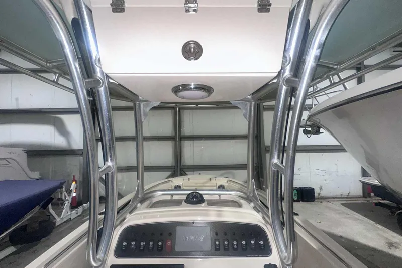 Slide: The Image of 2021 Grady-White Fisherman 216 boat console in a storage facility. - 26