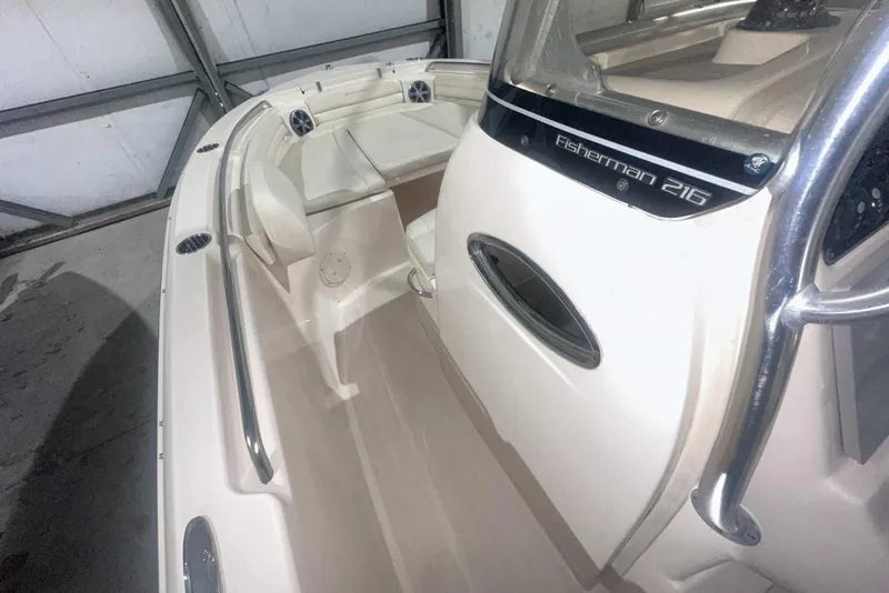 Slide: The Image of 2021 Grady-White Fisherman 216 boat interior with seating and console details. - 33