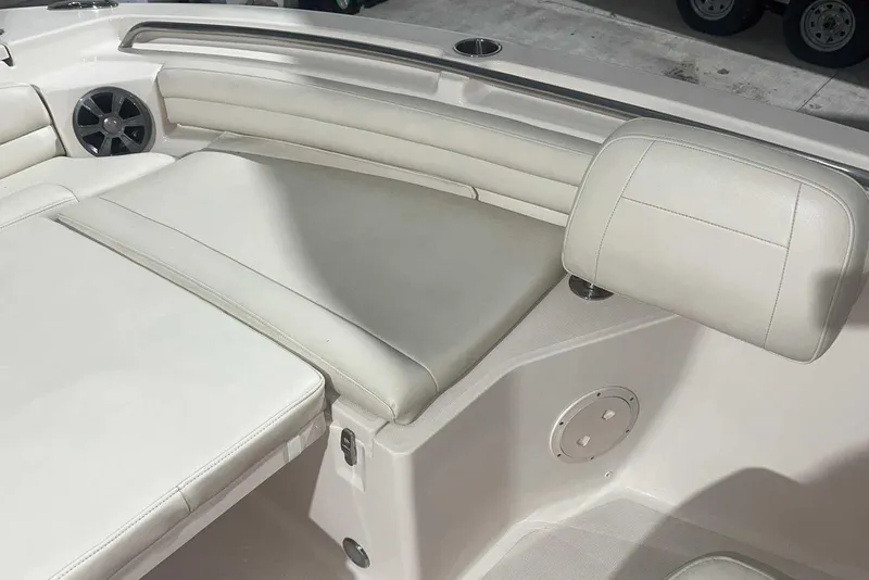 Slide: The Image of 2021 Grady-White Fisherman 216 boat interior with cushioned seating and speaker. - 36