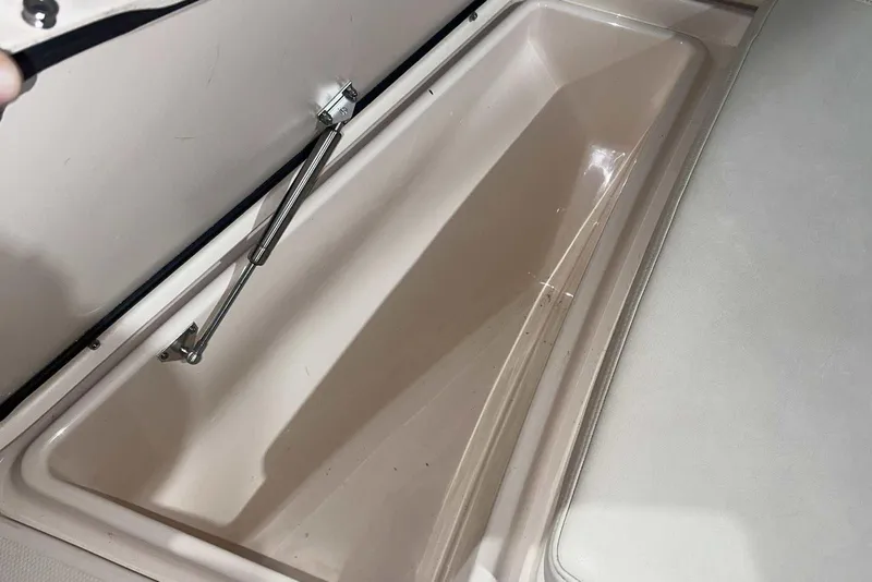 Slide: The Image of Storage compartment of 2021 Grady-White Fisherman 216 boat, open and empty. - 39