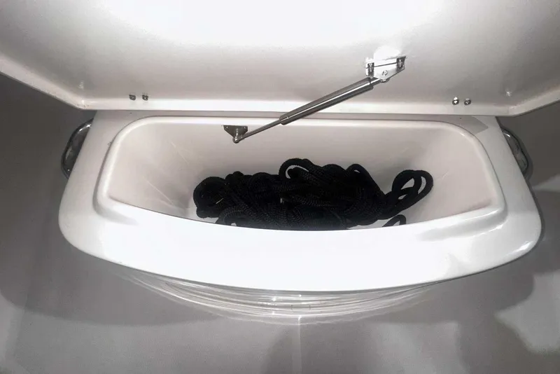 Slide: The Image of Storage compartment with rope in 2021 Grady-White Fisherman 216 boat. - 42