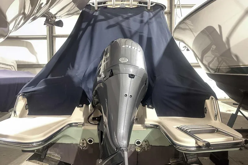 Slide: The Image of 2021 Grady-White Fisherman 216 boat with Yamaha 200 engine, covered and stored indoors. - 7