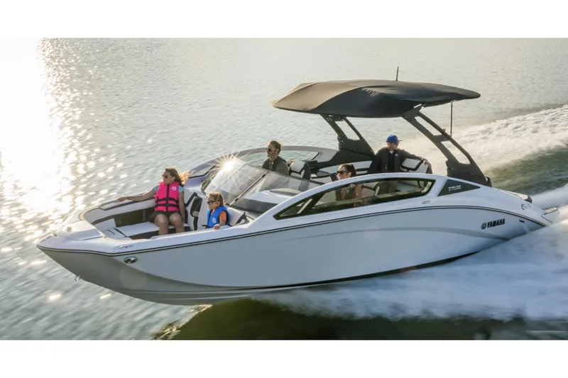 Slide: The Image of Manufacturer Provided Image: 2025 Yamaha Boats 275SE cruising on water with passengers enjoying the ride. - 11