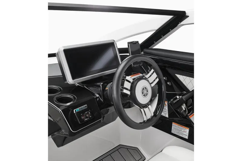 Slide: The Image of Manufacturer Provided Image: 2025 Yamaha Boats 275SE dashboard with steering wheel and touchscreen display. - 15
