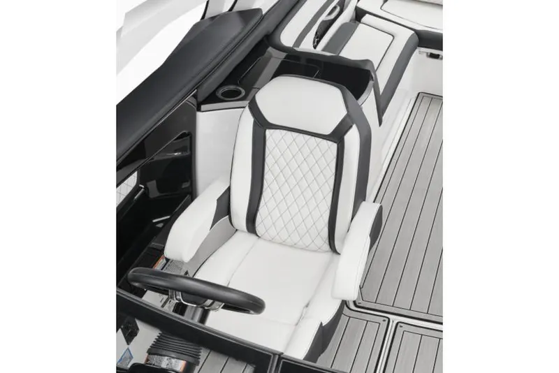 Slide: The Image of Manufacturer Provided Image: 2025 Yamaha Boats 275SE interior with luxurious white and black seating and sleek design. - 16