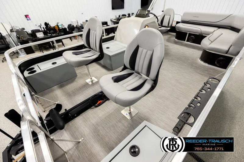 Slide: The Image of 2024 Lowe Ultra 162 Fish & Cruise boat interior with seating and storage compartments. - 10