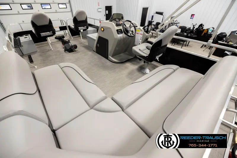 Slide: The Image of 2024 Lowe Ultra 162 Fish & Cruise boat interior with seating and control console. - 11