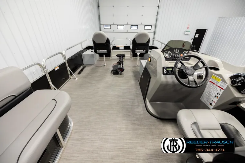 Slide: The Image of 2024 Lowe Ultra 162 Fish & Cruise boat interior with seating and control console. - 17