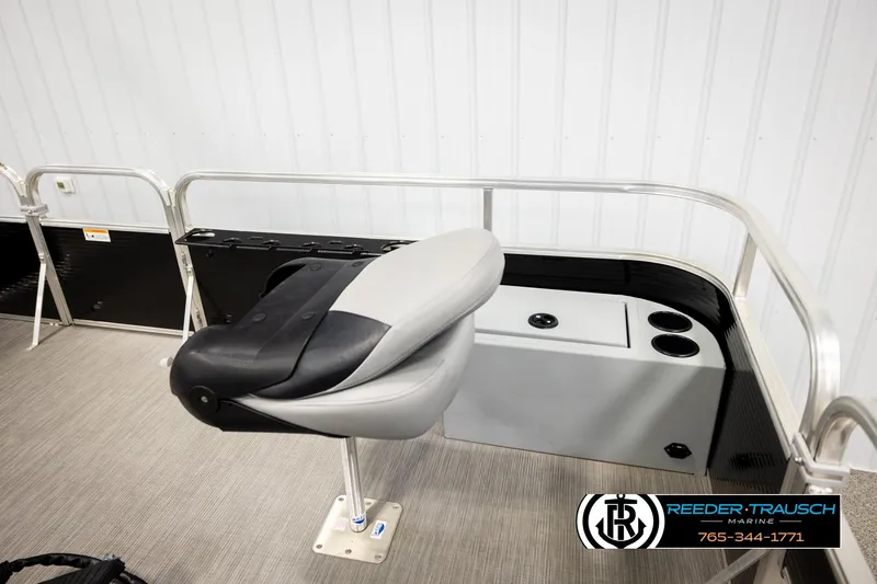 Slide: The Image of 2024 Lowe Ultra 162 Fish & Cruise boat interior with seating and storage. - 23