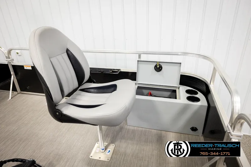 Slide: The Image of 2024 Lowe Ultra 162 Fish & Cruise boat interior with seating and storage. - 24