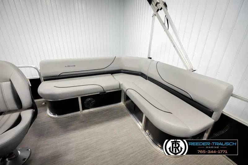 Slide: The Image of 2024 Lowe Ultra 162 Fish & Cruise boat interior with gray seating and modern design. - 25