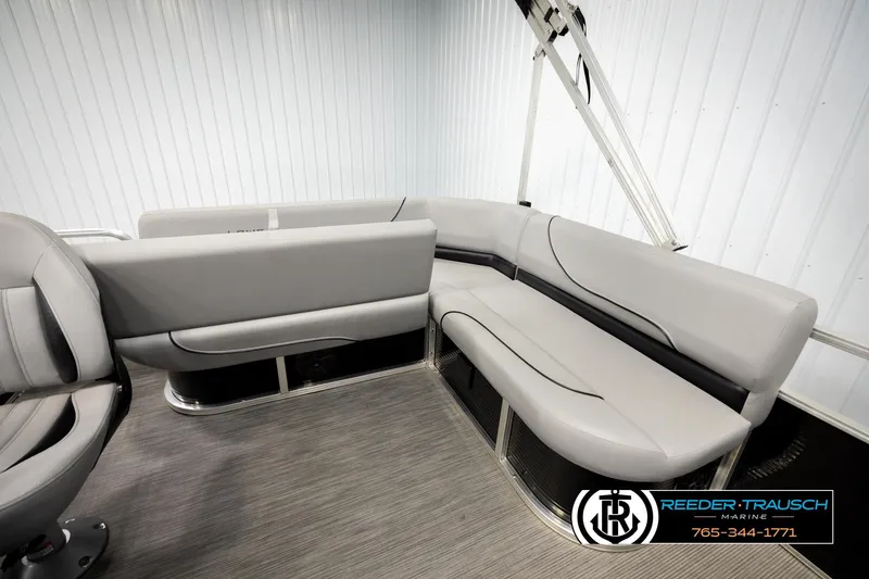 Slide: The Image of 2024 Lowe Ultra 162 Fish & Cruise boat interior with gray seating and modern design. - 26