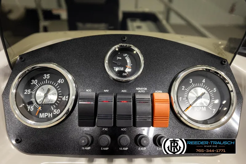 Slide: The Image of Dashboard of 2024 Lowe Ultra 162 Fish & Cruise boat with gauges and controls. - 31
