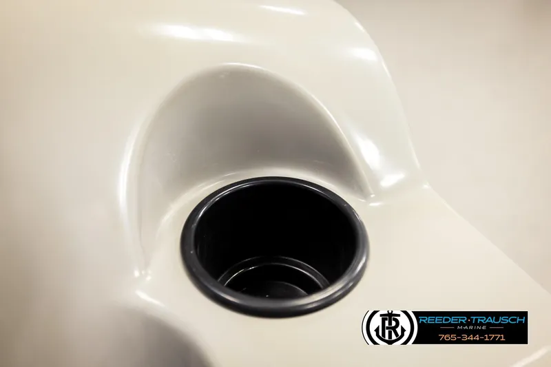 Slide: The Image of Close-up of a 2024 Lowe Ultra 162 Fish & Cruise boat cup holder. - 32