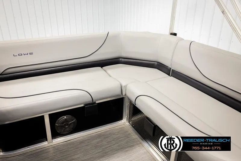 Slide: The Image of 2024 Lowe Ultra 162 Fish & Cruise boat interior with sleek seating design. - 35