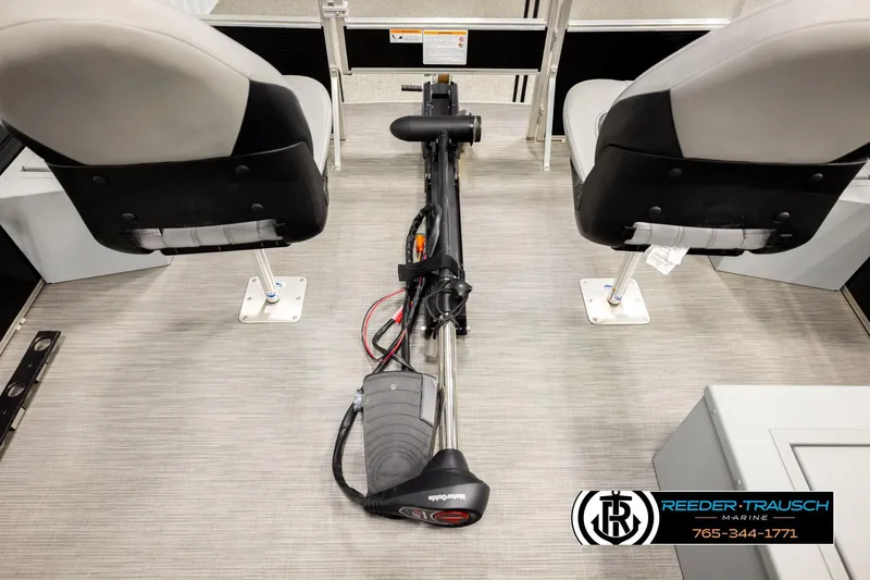 Slide: The Image of 2024 Lowe Ultra 162 Fish & Cruise interior with seats and trolling motor. - 42