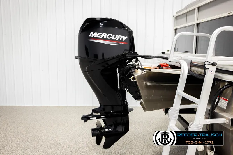 Slide: The Image of 2024 Lowe Ultra 162 Fish & Cruise with Mercury outboard motor, displayed indoors. - 45