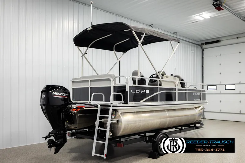 Slide: The Image of 2024 Lowe Ultra 162 Fish & Cruise pontoon boat in showroom with Mercury engine. - 6