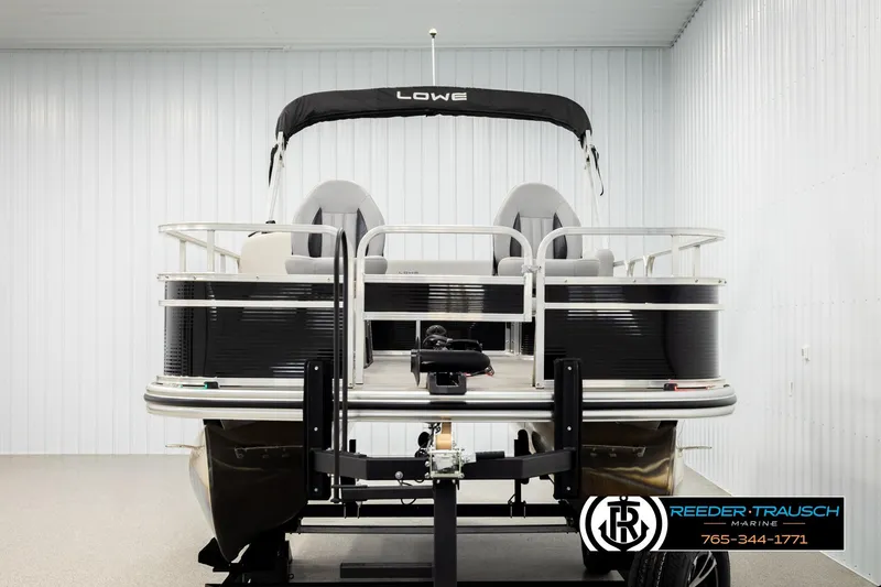Slide: The Image of 2024 Lowe Ultra 162 Fish & Cruise pontoon boat in showroom, front view. - 8