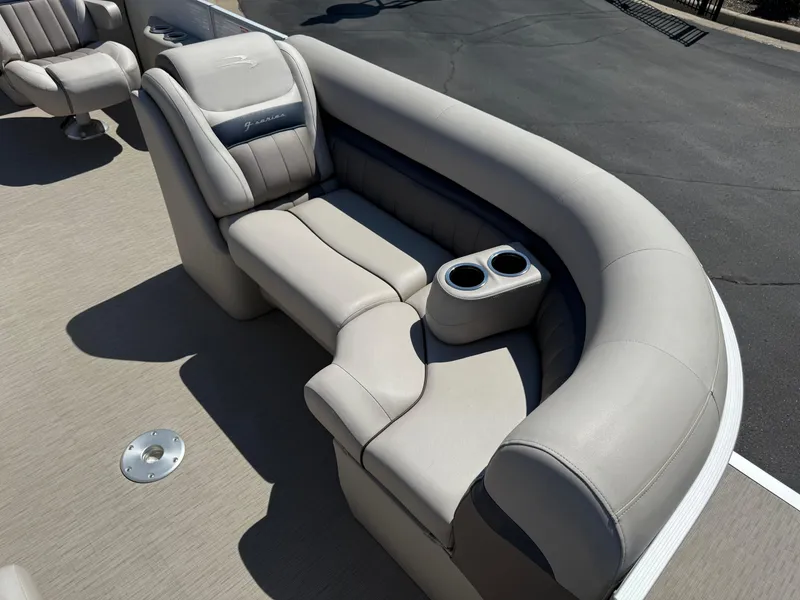Slide: The Image of 2017 Bennington G22 boat interior with plush seating and cup holders. - 5